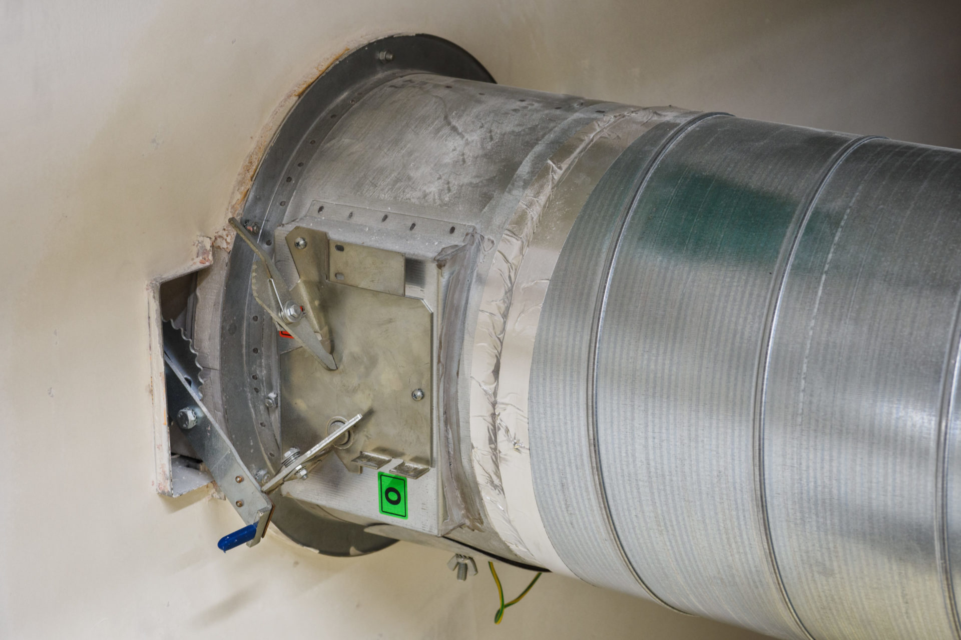 Large metal air duct and fire damper.